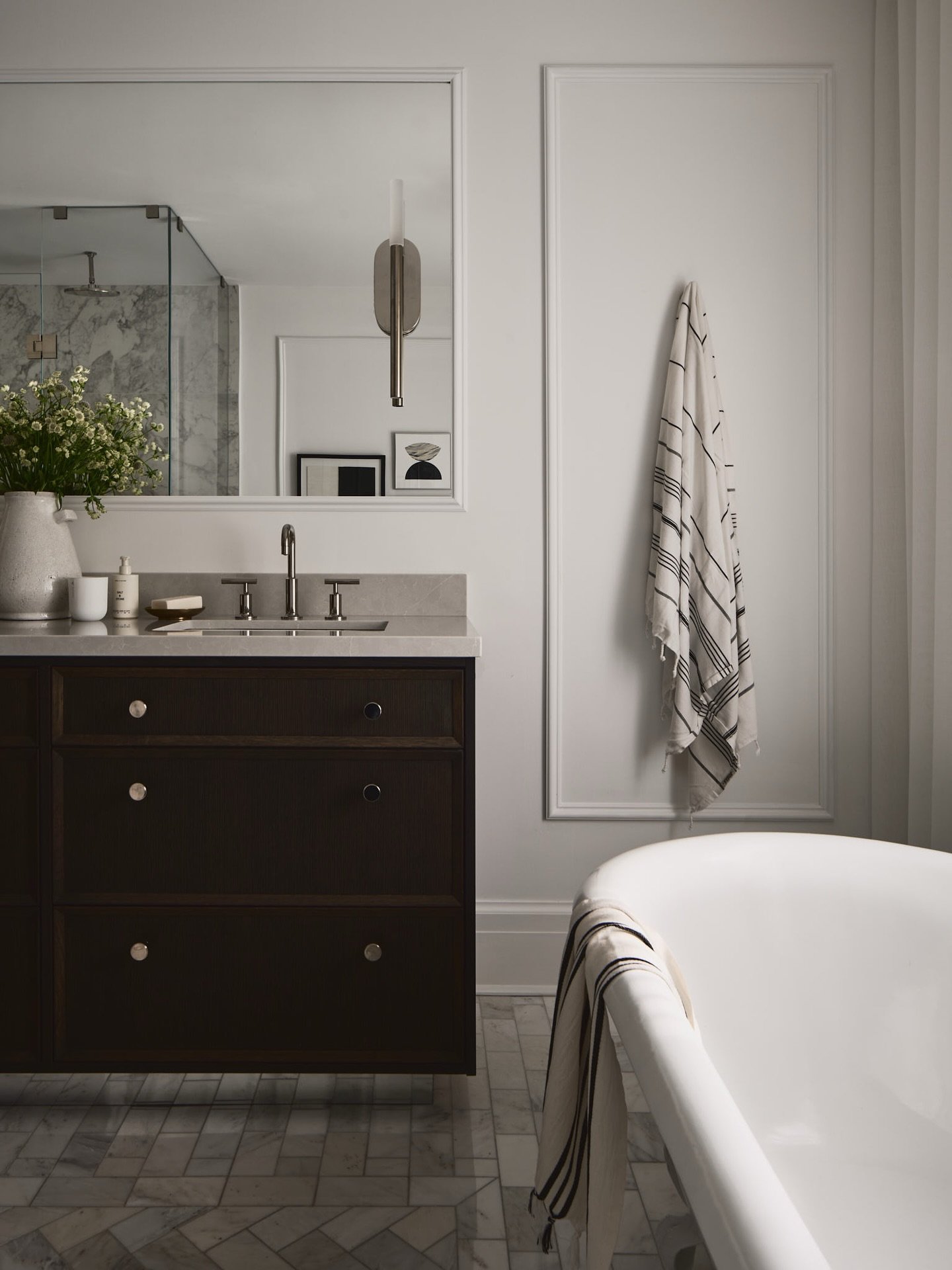 Love this vanity we provided for our clients in the Ascent door profile in white oak with pebblewood stain. Balancing the remaining finishes of this en-suite beautifully. 

Designed by: @designstrom 
Photo: @morley2space | @2spacephoto