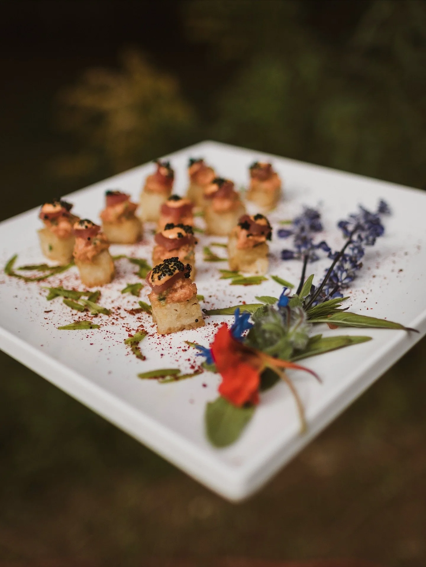 A dreamy, moody September cocktail hour. ✨
@chrisbennettweddings stunning us with these incredible food shots!
•
Catering, Bar Service, Day-of Coordination, Planning: @blacktiecateringandevents 
Florist: @honeysuckleway 
Rentals: @wallaceeven