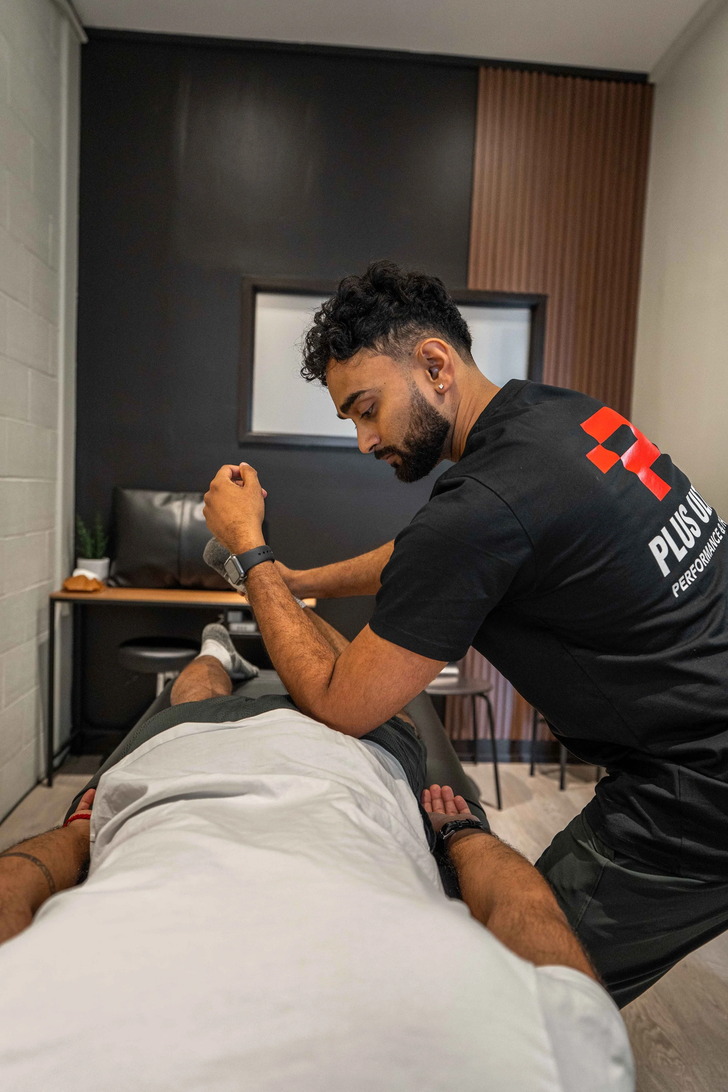 Massage Therapist Vithursun providing release to the hips