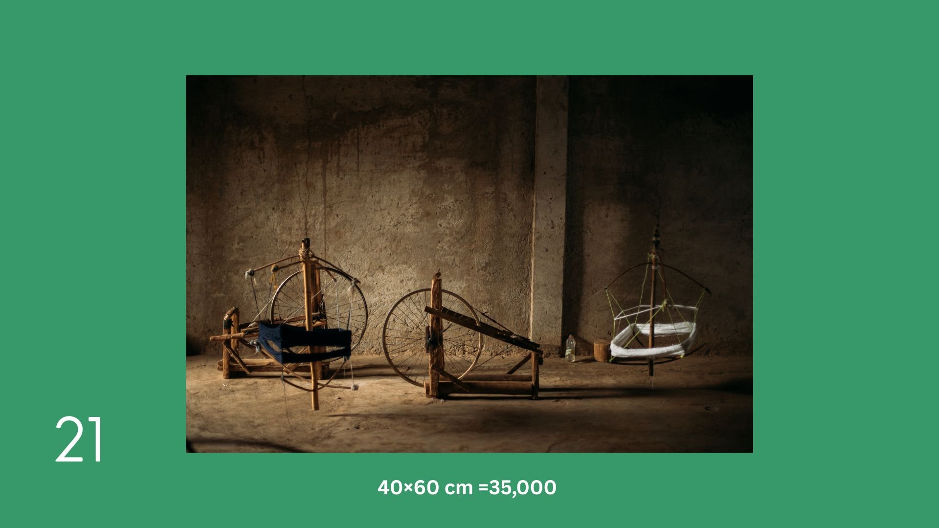 Three wooden bicycle sculptures in a rustic room, with one resembling a boat, placed on the floor with a water bottle nearby.