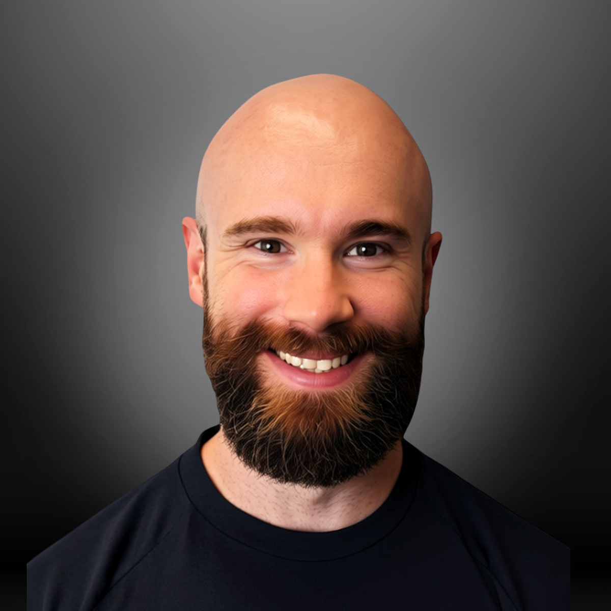 Portrait of a smiling man with a beard, bald head, light skin, wearing a black shirt, against a dark gray background.