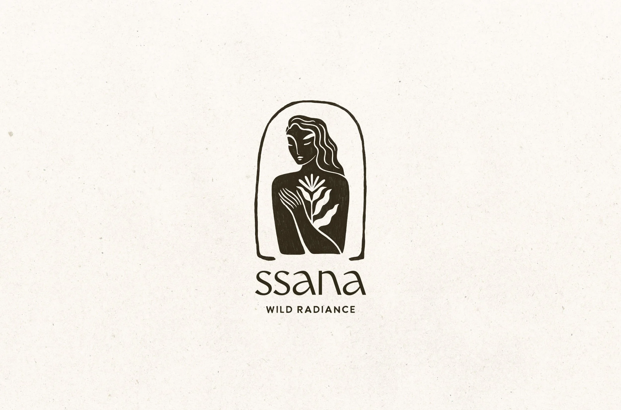 Artisan hand drawn textured logo logo in dark brown for Ssana's skincare brand reflecting calm, nature and the embrace of mother earth