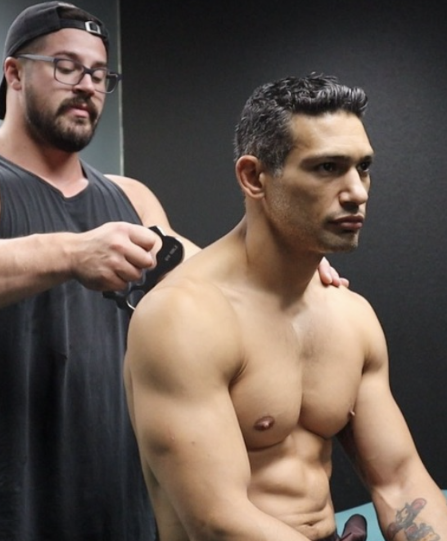 Lower Back or Shoulder Pain When Lifting? When to See a Trainer vs. a Massage Therapist