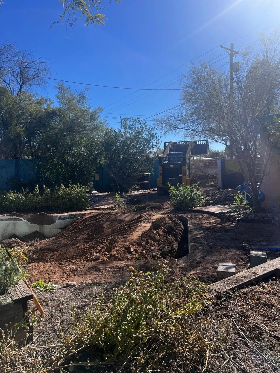 First step is to bust up the pool decking, and fill it in! 