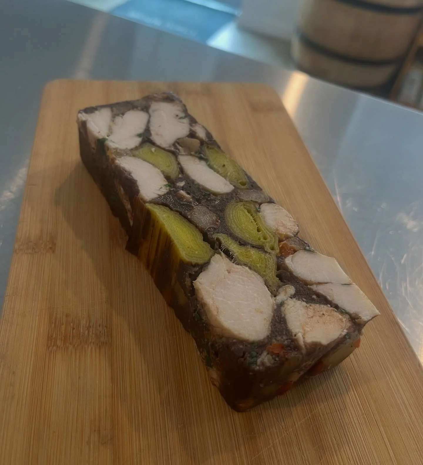 BC raised Chicken Terrine, blackened quince jelly, roasted leak, lemon, star anise, chives and chili cured pork fat🔥
@carnistkelowna 🐓 
.
#chicken #terrine #charcuterie #supportlocal #business