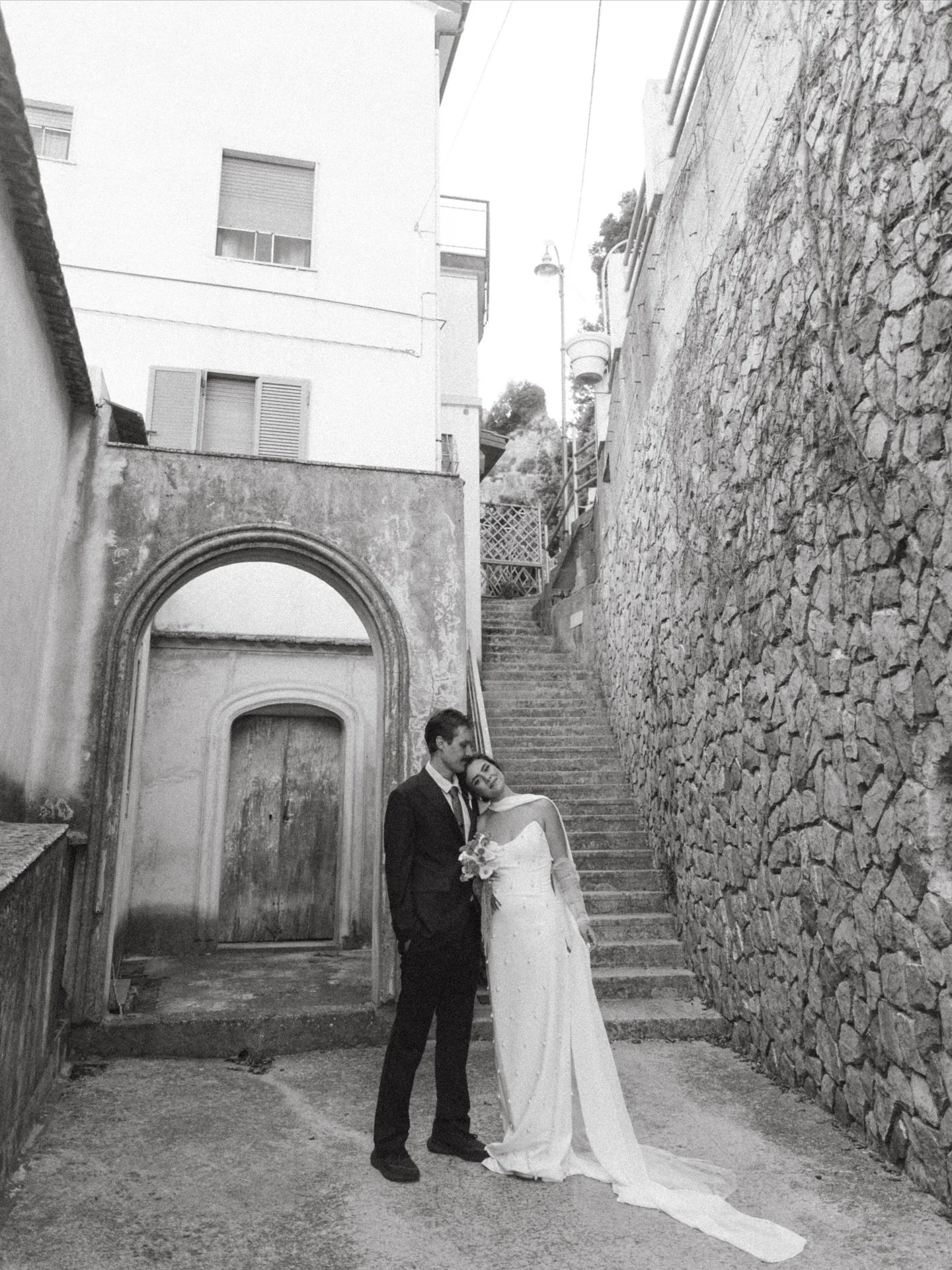 An Amalfi Coast dream ✨ 🧡obsessed with this little sneak peak. Can&rsquo;t get enough of these two. 
&bull;
Bride - @_jess.chillin 
Photography - @annagracec 
Florals - @staraceflorist
Wedding dress - @lovelybridechs