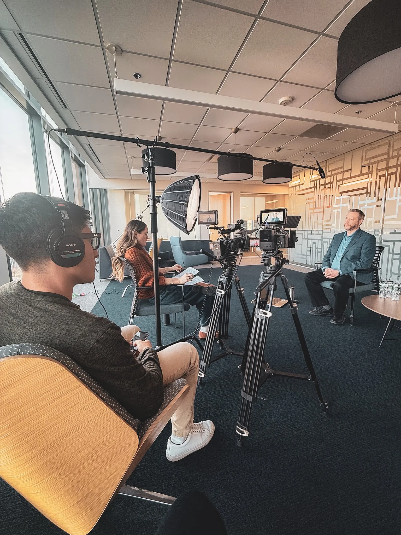 Behind-the-scenes photo of a multi-camera corporate interview setup in Raleigh, NC