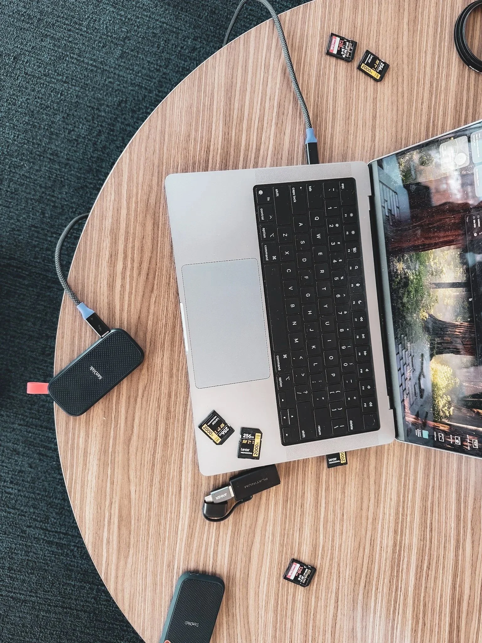 Organized camera media cards during a Raleigh corporate video shoot