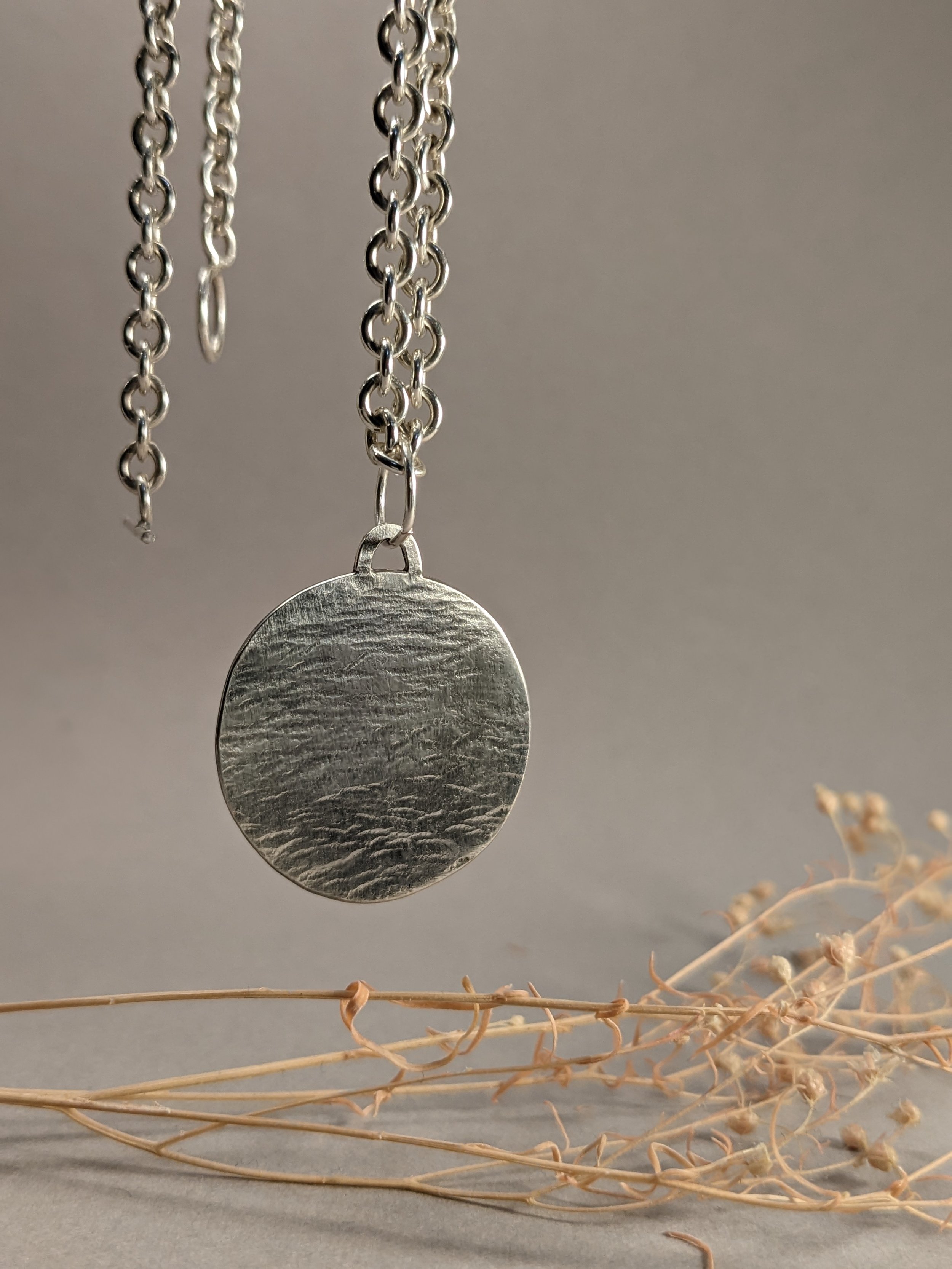 disc pendant