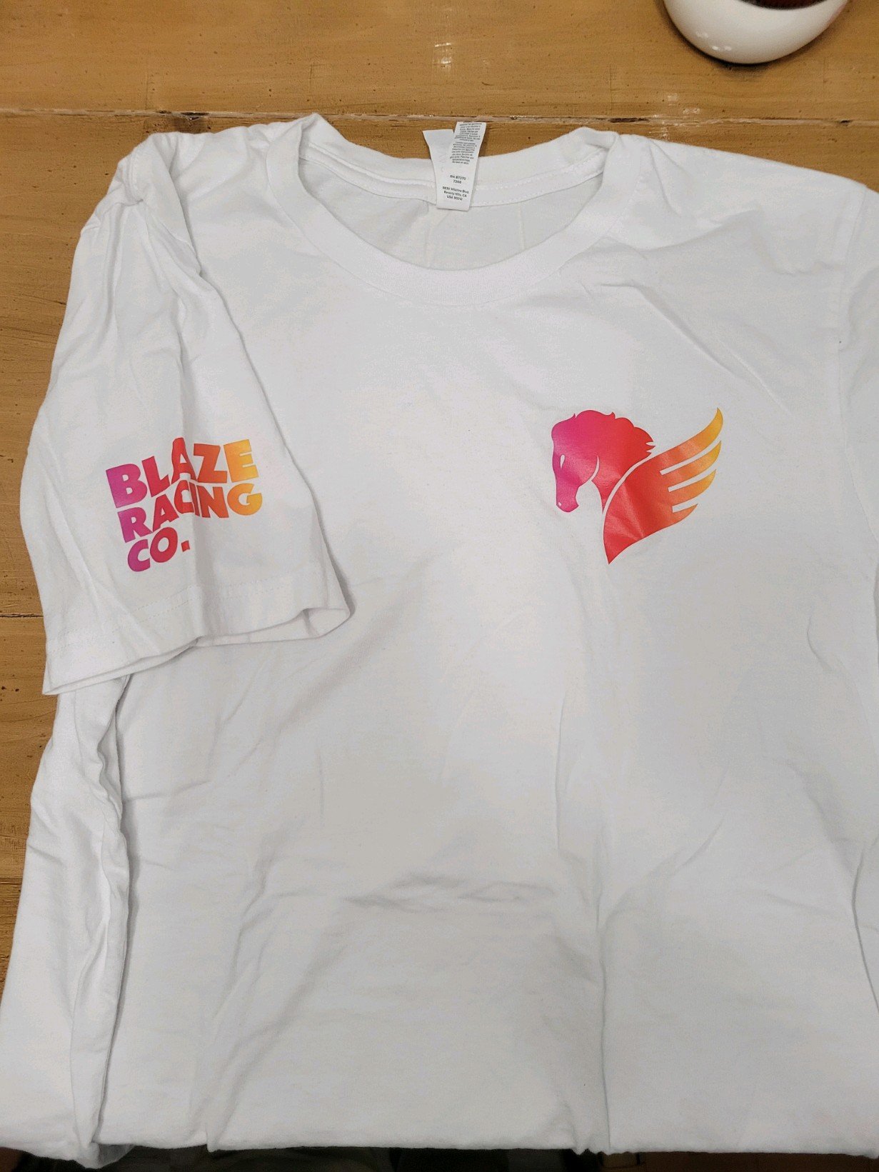 White t-shirt with Blaze Racing Co. on sleeve