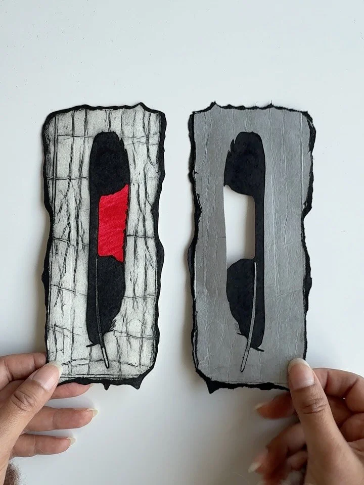 The original TetraPak plate and the print it became. For this red-tailed black cockatoo feather, I cut the finished print back to the shape of the plate, so there&rsquo;s no neat rectangle of white paper around it. I like letting the torn, irregular 