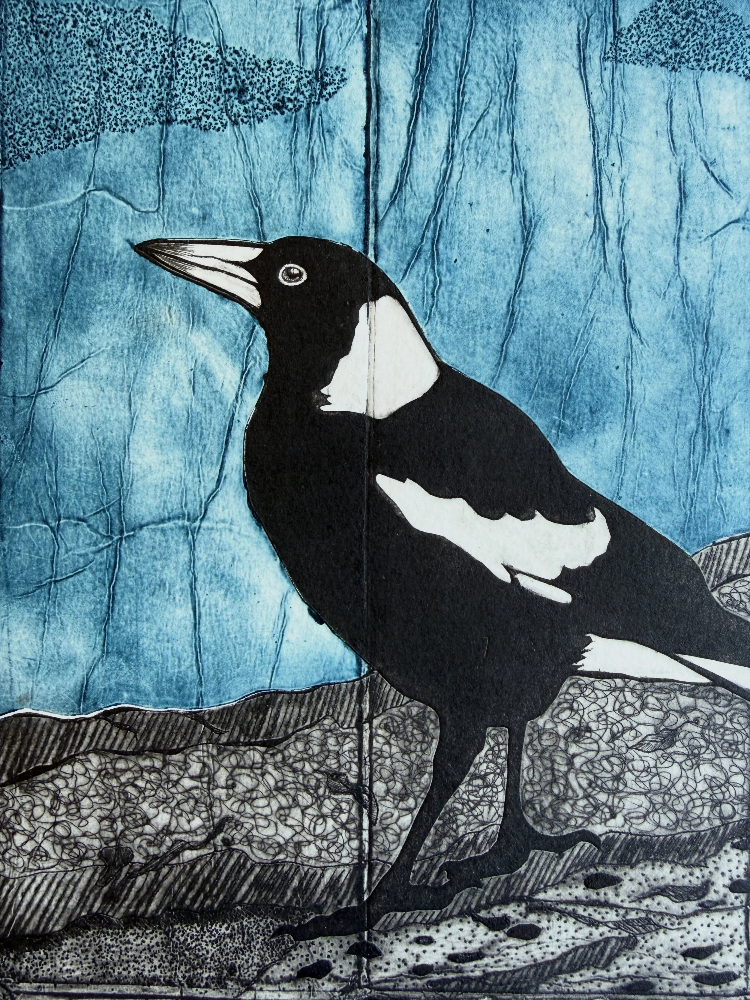 The Blue Beyond. This started off as a single TetraPak, but to get the two colours, I cut the silhouette of the magpie and ground out and separated the background. I inked them separately and put them back together like a jigsaw, and then ran it thro