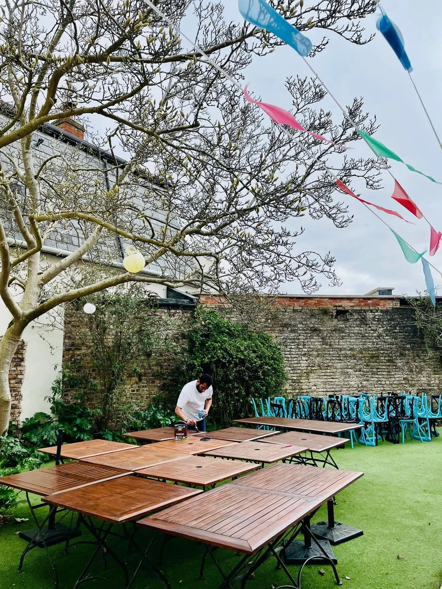 Who's ready for some warmer weather? It's certainly feeling very spring like today 🌼

Pulkit, our owner, has grabbed the paintbrush and is giving our outdoor tables a fresh new look. Be sure to check them out next time you visit us, and hopefully it