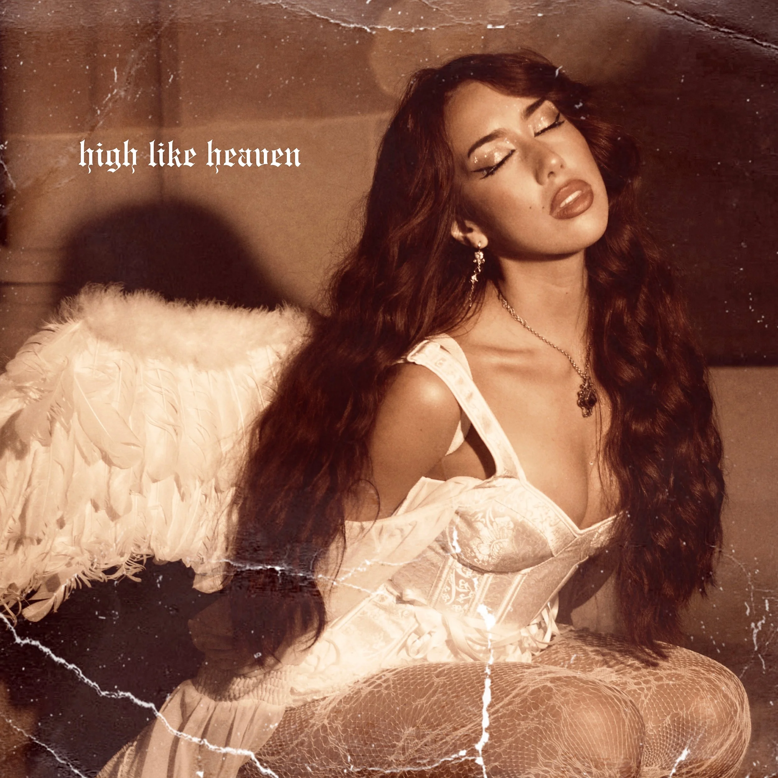 Liliana de la Rosa "High Like Heaven" single cover. Liliana wears white angel wings and a lace corset in a vintage, sepia-toned aesthetic.