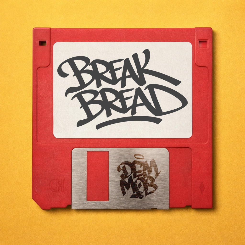 Single artwork for DEM MOB's "Break Bread." A red floppy disk on a yellow background features the song title and band logo in black graffiti script.