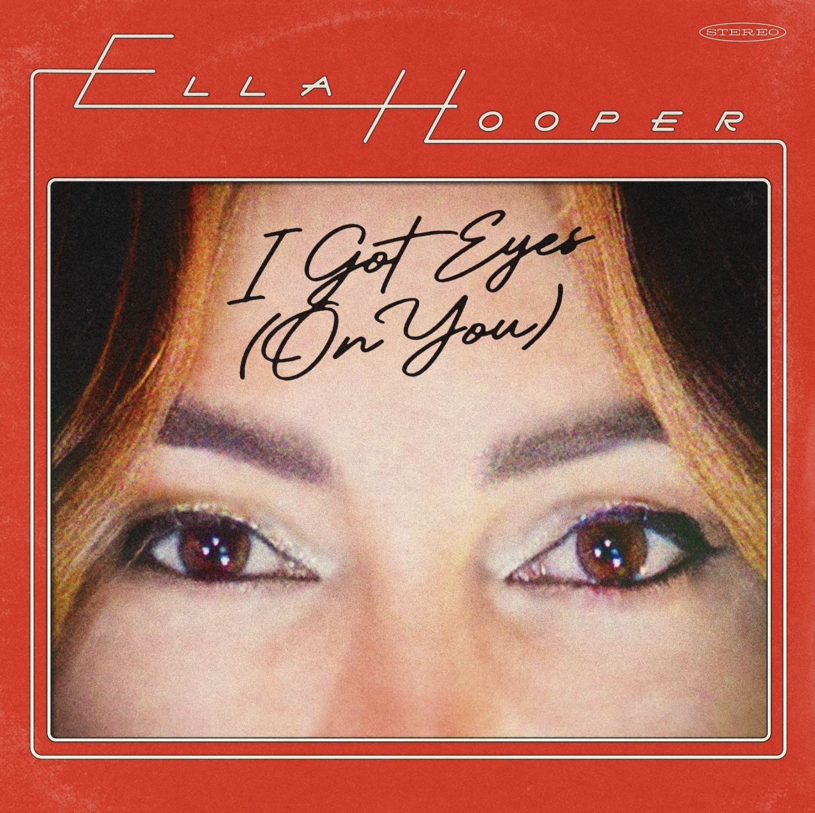Album cover for Ella Hooper's single "I Got Eyes (On You)" featuring a close-up of her eyes against a vibrant red background with retro typography.