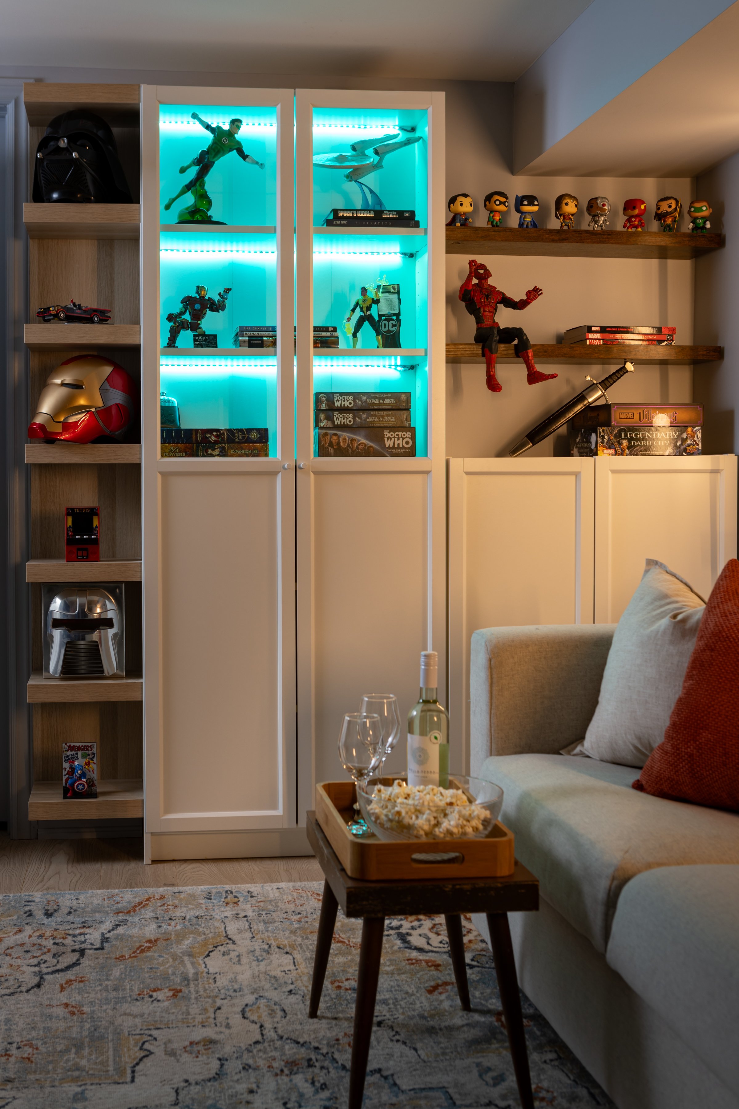 Living room display wall with accent lighting illuminated in Toronto Ontario, Project Ten Forward by Inspired Spaces Design Studio