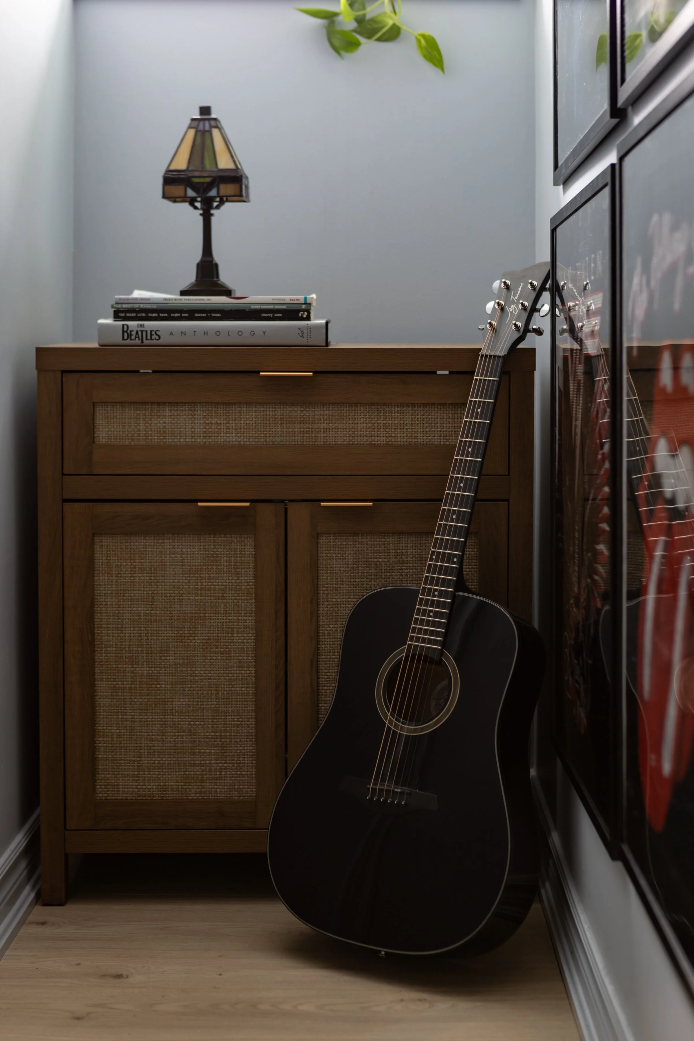 The Hallway to Nowhere — a curated music nook with guitar display, poster wall, and eclectic cabinet in Toronto Ontario, Project Ten Forward by Inspired Spaces Design Studio