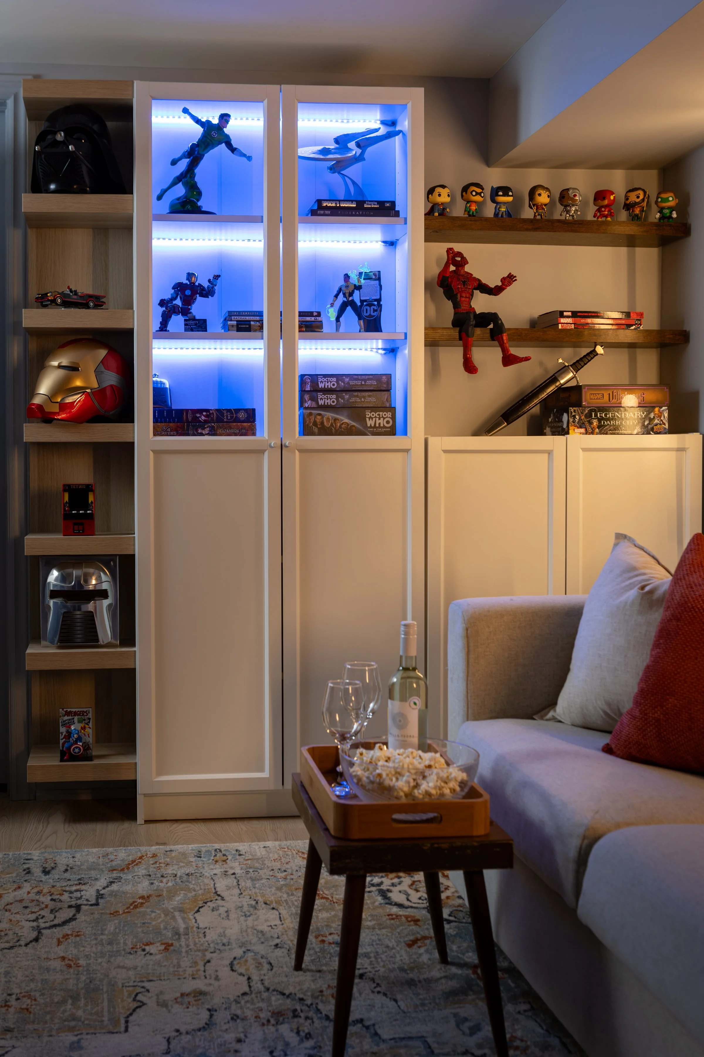 Living room display wall with accent lighting illuminated in Toronto Ontario, Project Ten Forward by Inspired Spaces Design Studio