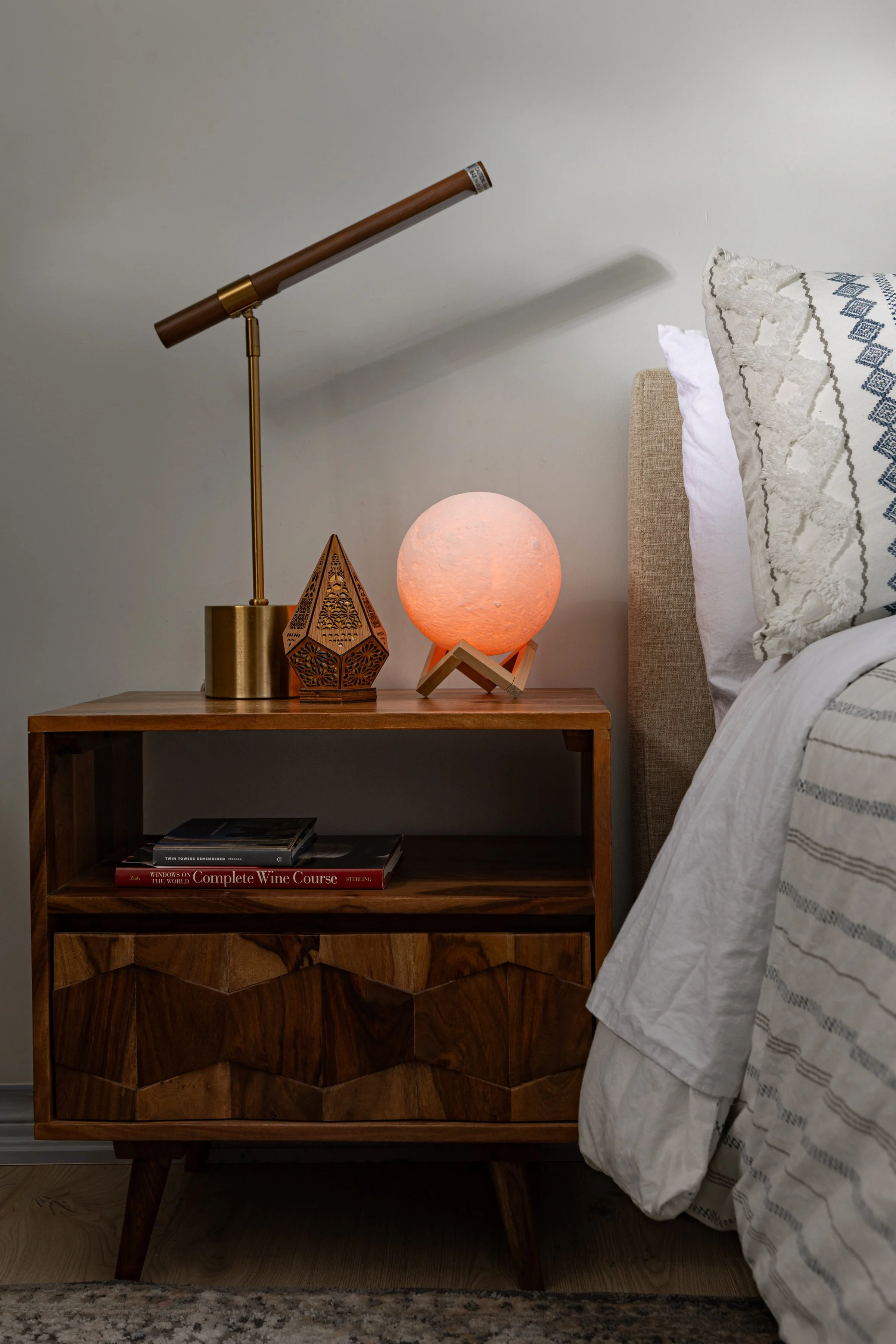 Bedside table vignette — Bedroom interior featuring dressing area, work desk, and upholstered bed in Toronto Ontario, Project Ten Forward by Inspired Spaces Design Studio