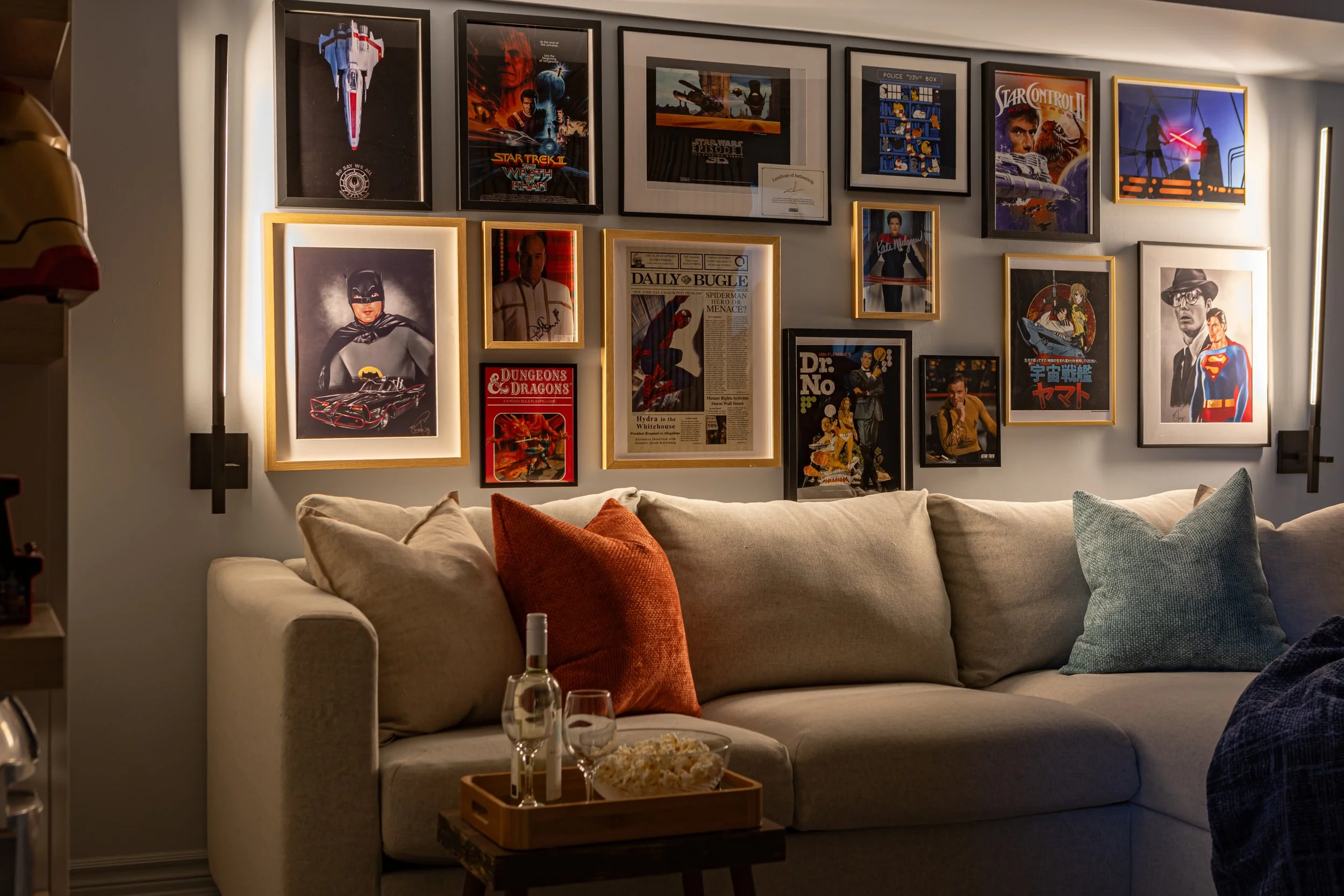 Living room with gallery wall, open and closed display storage, and media wall with wood slat feature in Toronto Ontario, Project Ten Forward by Inspired Spaces Design Studio