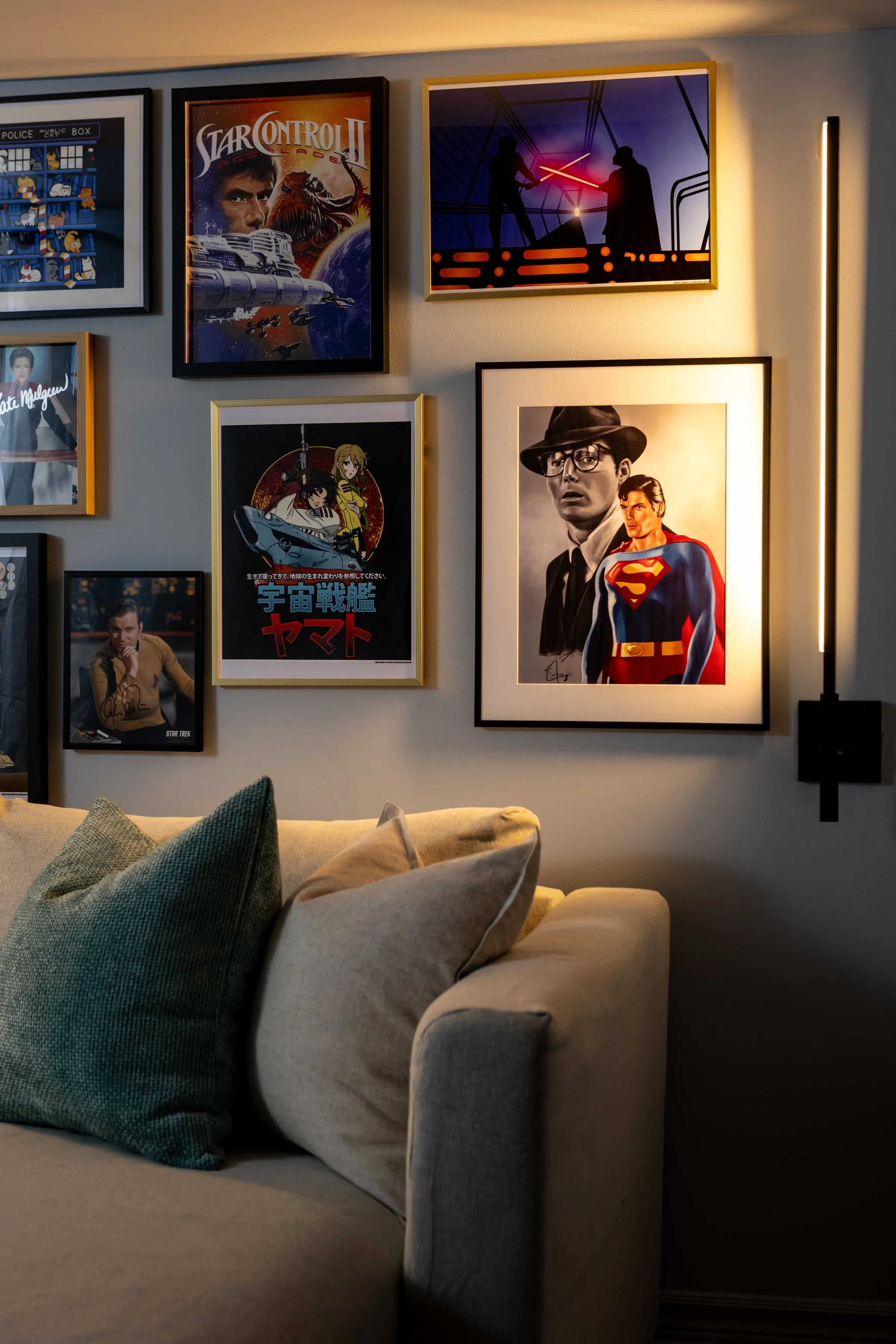 Gallery wall detail behind sofa in Toronto Ontario, Project Ten Forward by Inspired Spaces Design Studio