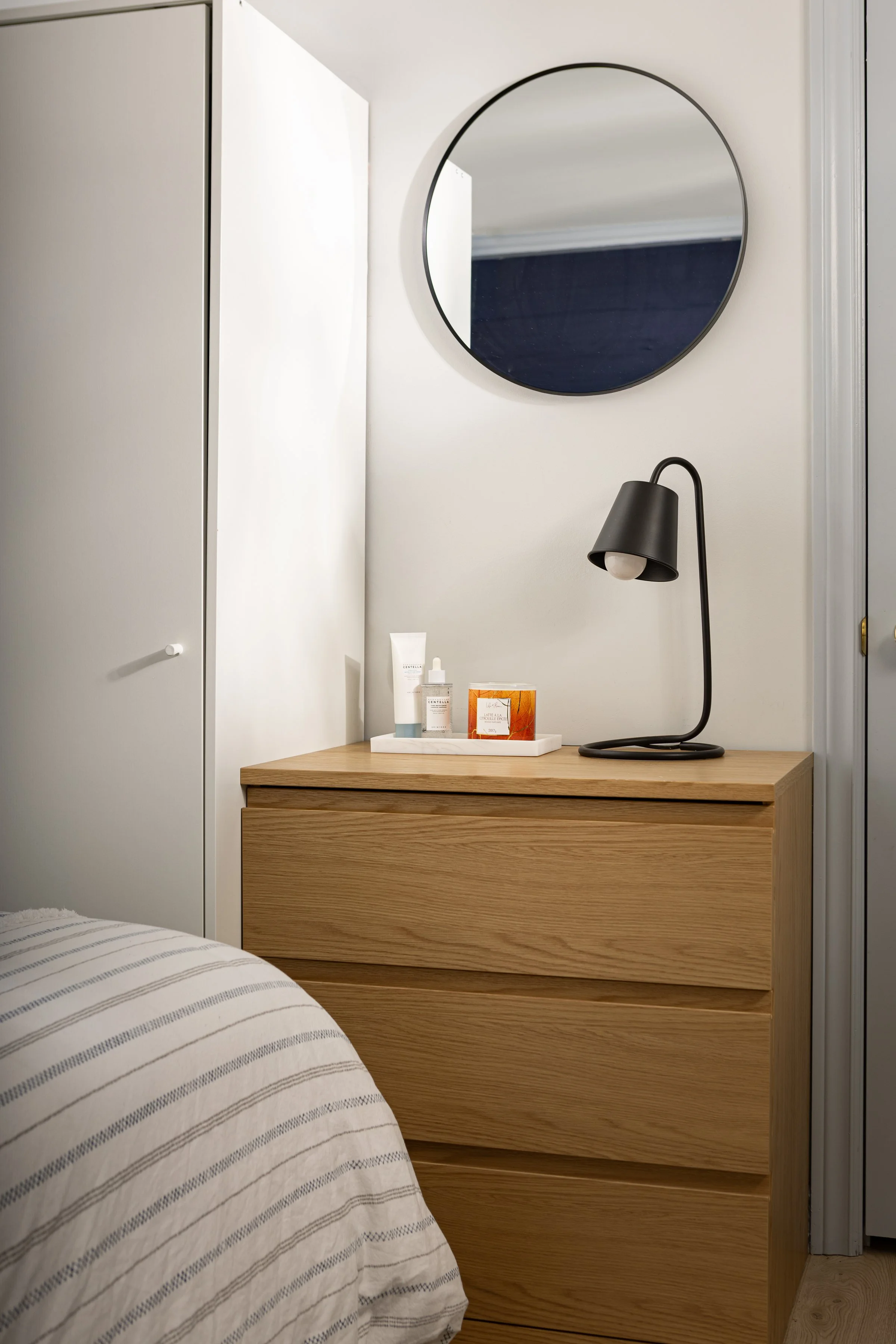 Dressing area detail with full-height storage — Bedroom interior featuring dressing area, work desk, and upholstered bed in Toronto Ontario, Project Ten Forward by Inspired Spaces Design Studio