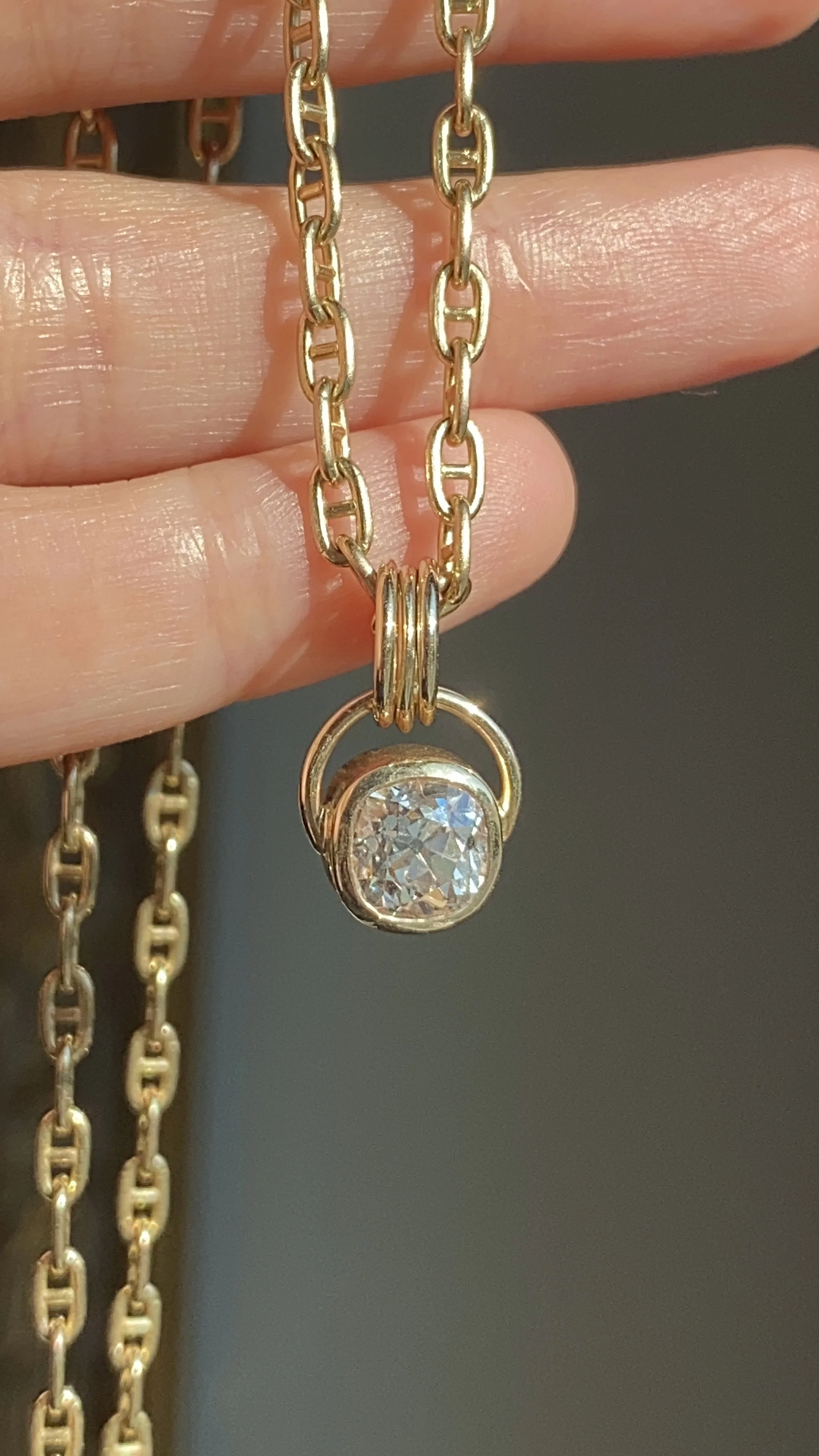 antique diamond pendant set in 14k yellow gold