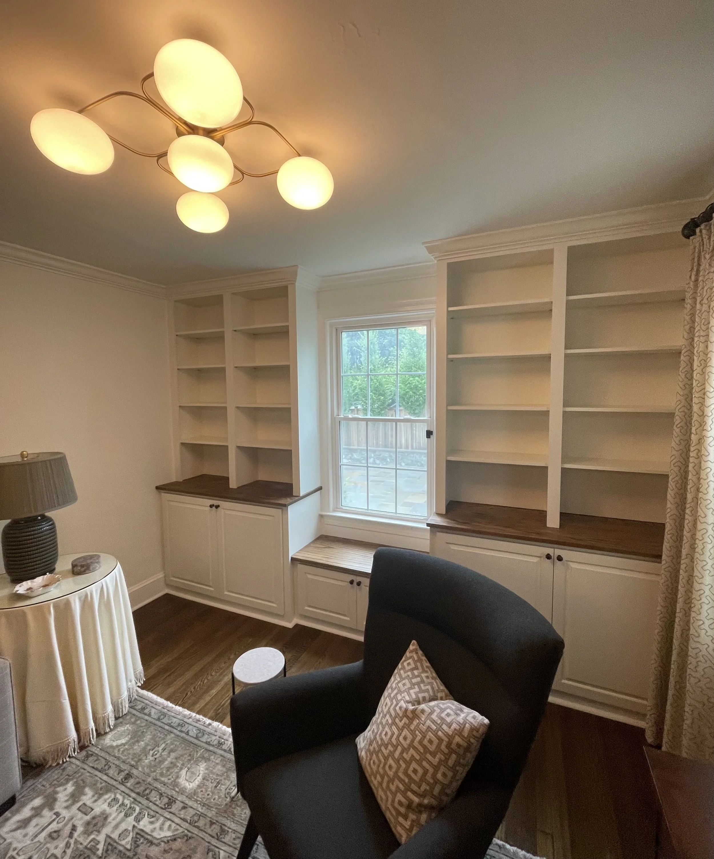 Living room built-in bookcases and base cabinets