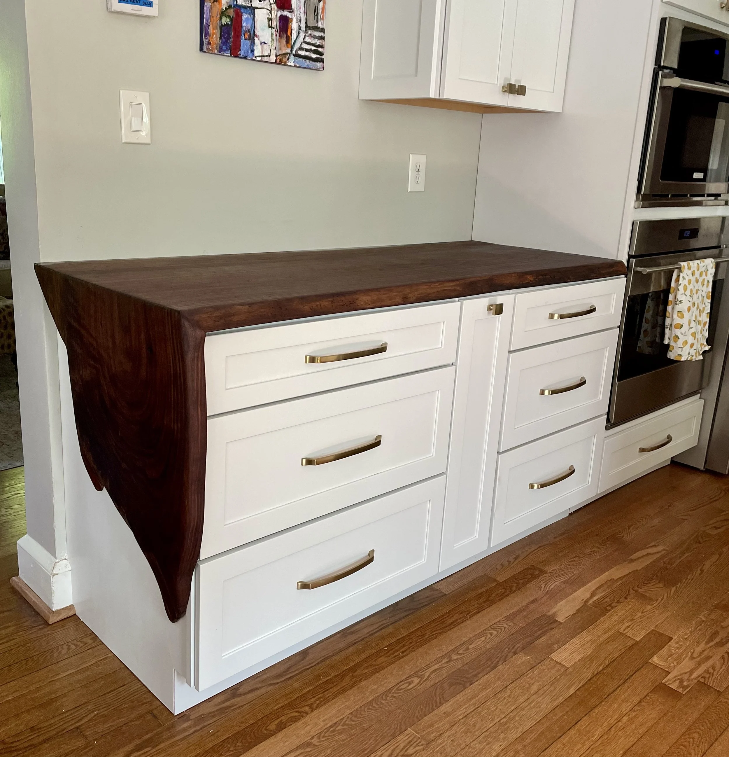 Live edge walnut countertop with waterfall effect