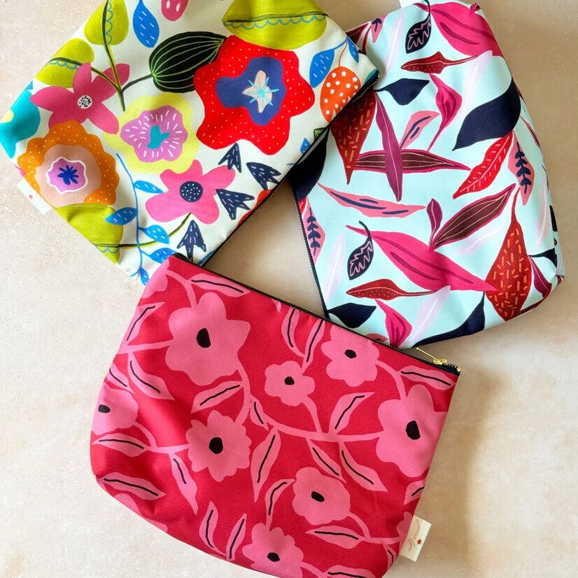Brightly coloured waterproof large toiletry bags for women by Jennie Fynn