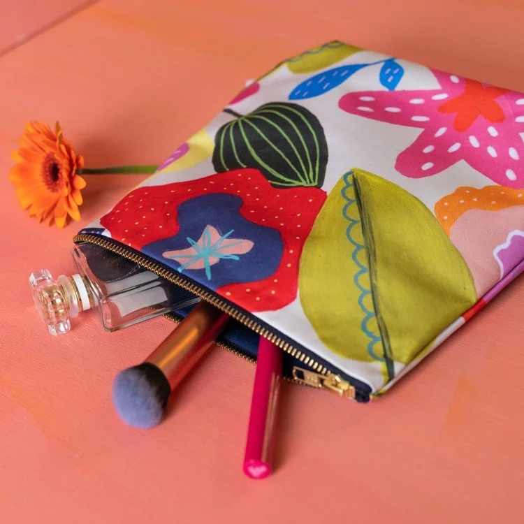 Large floral patterned makeup bag designed by Jennie Fynn