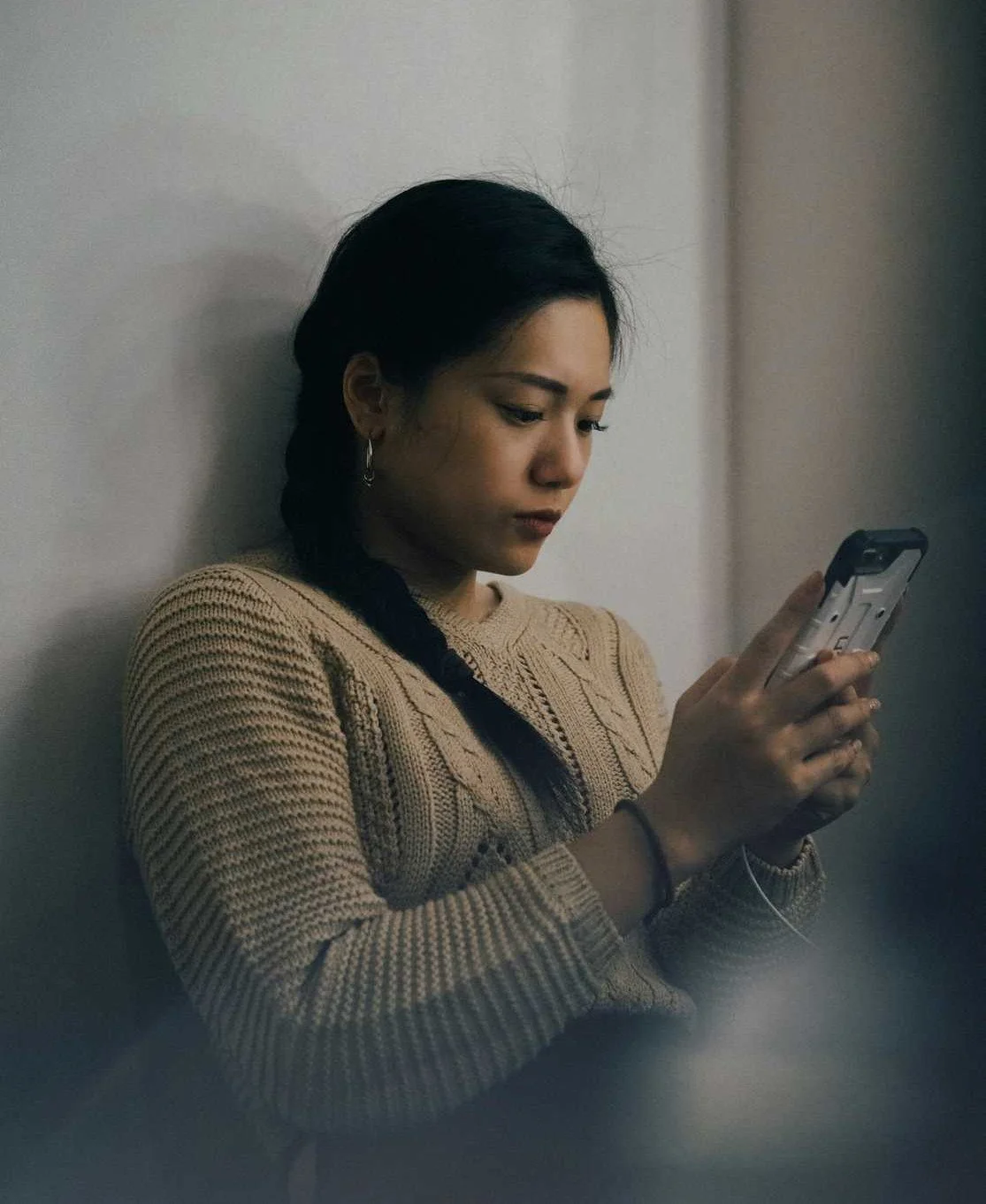 worried woman texting