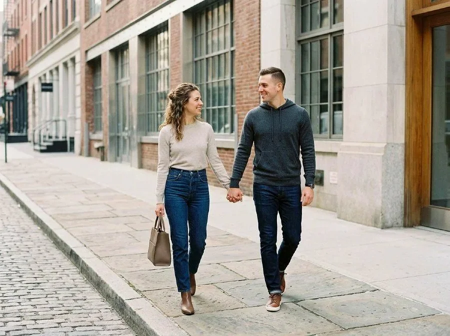 young couple in nyc walking and holding hands in new york