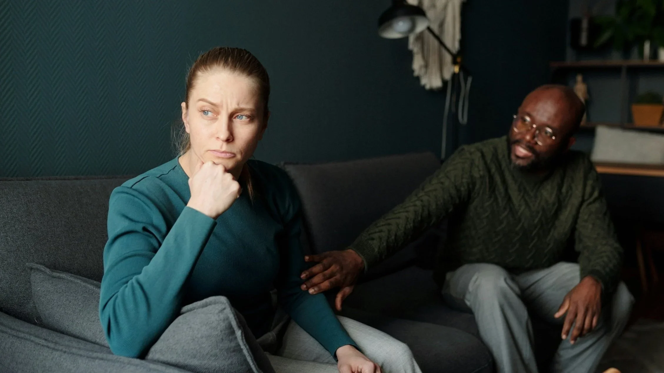 woman is upset while arguing with her partner