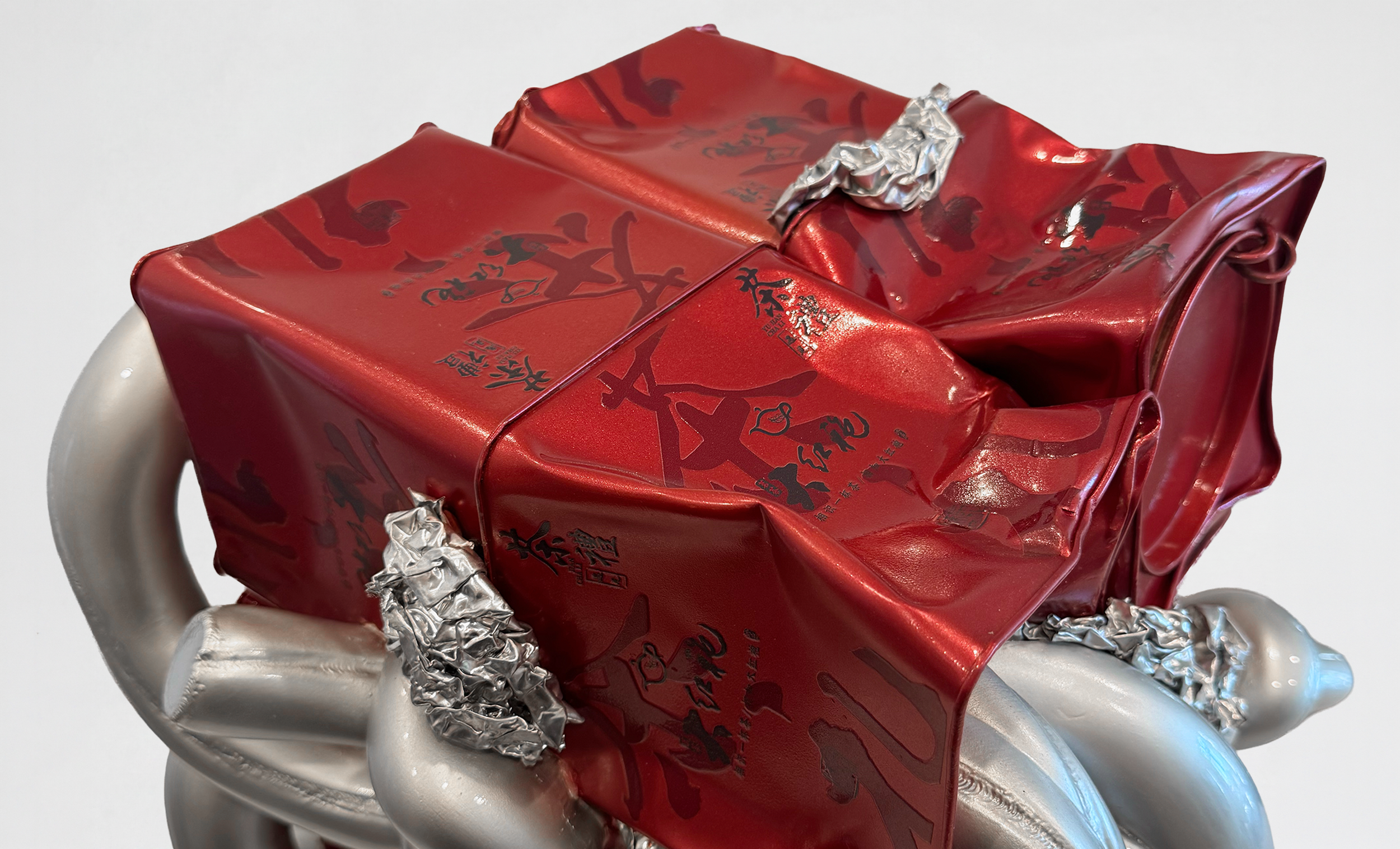   The Fault Monument , 2026, steel, tins, aluminum foil and resin, 21 × 14 × 14 inches, edition of 1 + 1 AP 