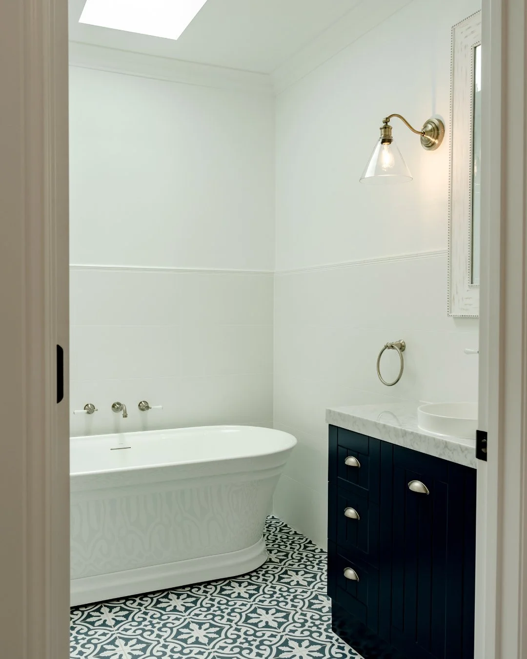 Your unique style, our craftsmanship.⁠
We love the selections our client made for this stunning bathroom, designed in a modern farmhouse style and brought to life with our top-tier workmanship. When you build with us, you can be confident you're gett