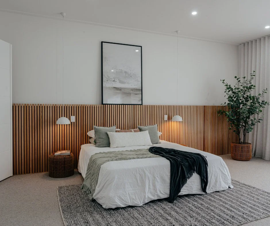 Swipe to see this room at handover vs. how our clients have styled it! ⁠
⁠
Featuring a stunning custom headboard, elegant pendant lighting, a spacious ensuite, and a generous walk-in wardrobe, this master suite truly ticks every box. That&rsquo;s the