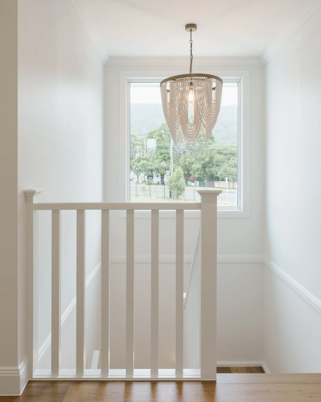 The staircase in your home doesn't have to be purely functional - we can turn even a space like this into a luxury feature!⁠
⁠
With sleek timber banisters and wainscoting that follows the incline of the steps, this client's journey upstairs is one of