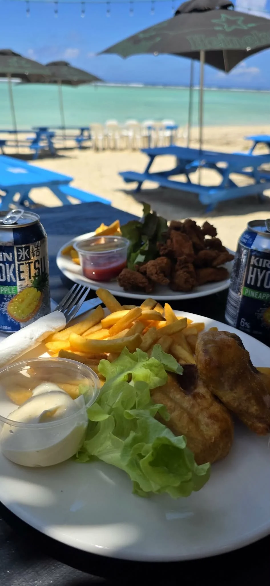 Guests enjoying beachfront dining at Vaiana's Beach Bar & Bistro in Rarotonga, Cook Islands