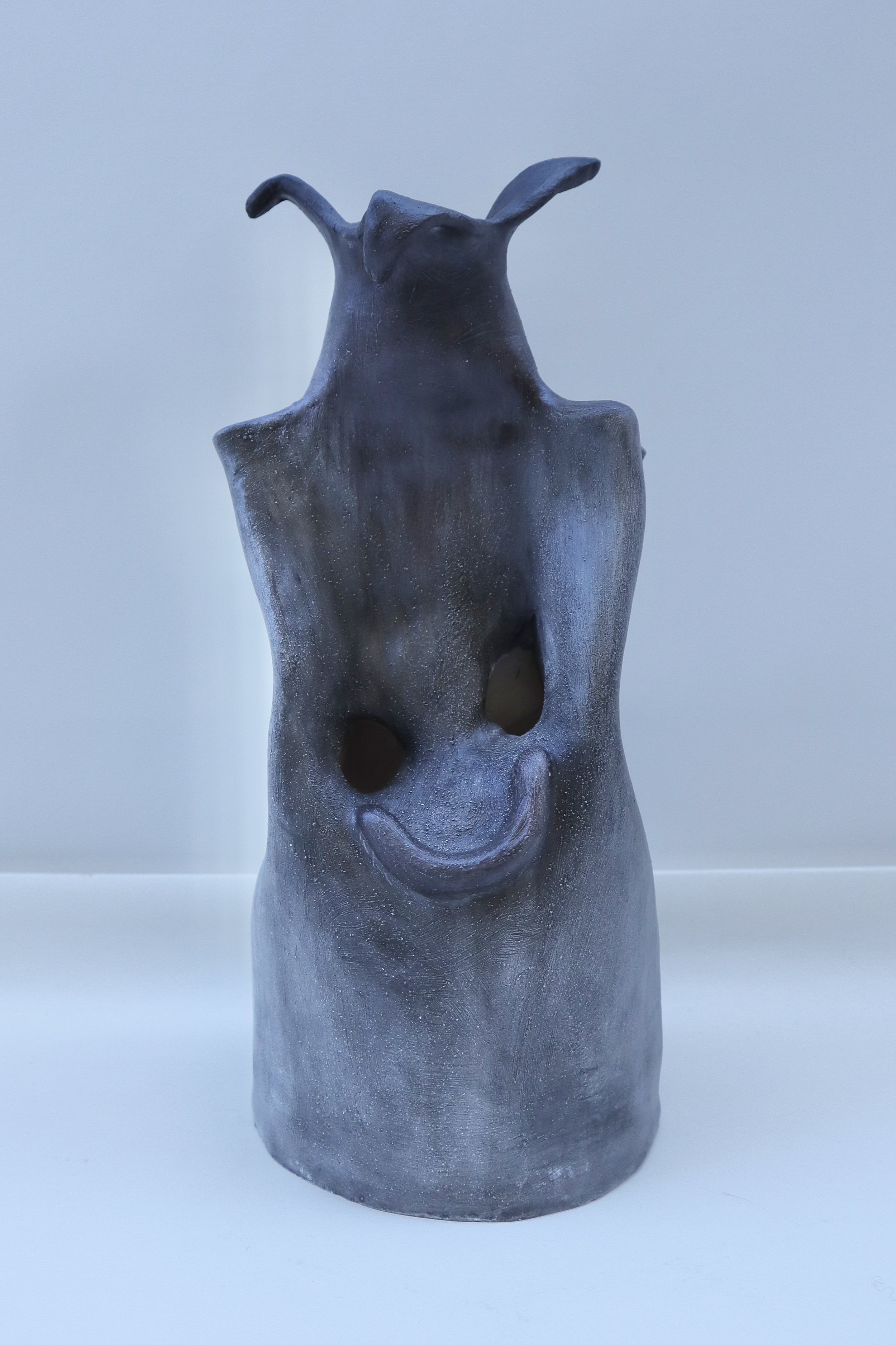 -The dunce, Winter 2023, Clay, 11 '' x 5 '', This was made during my 3D design studio class and is an abstract representation of a dunce.