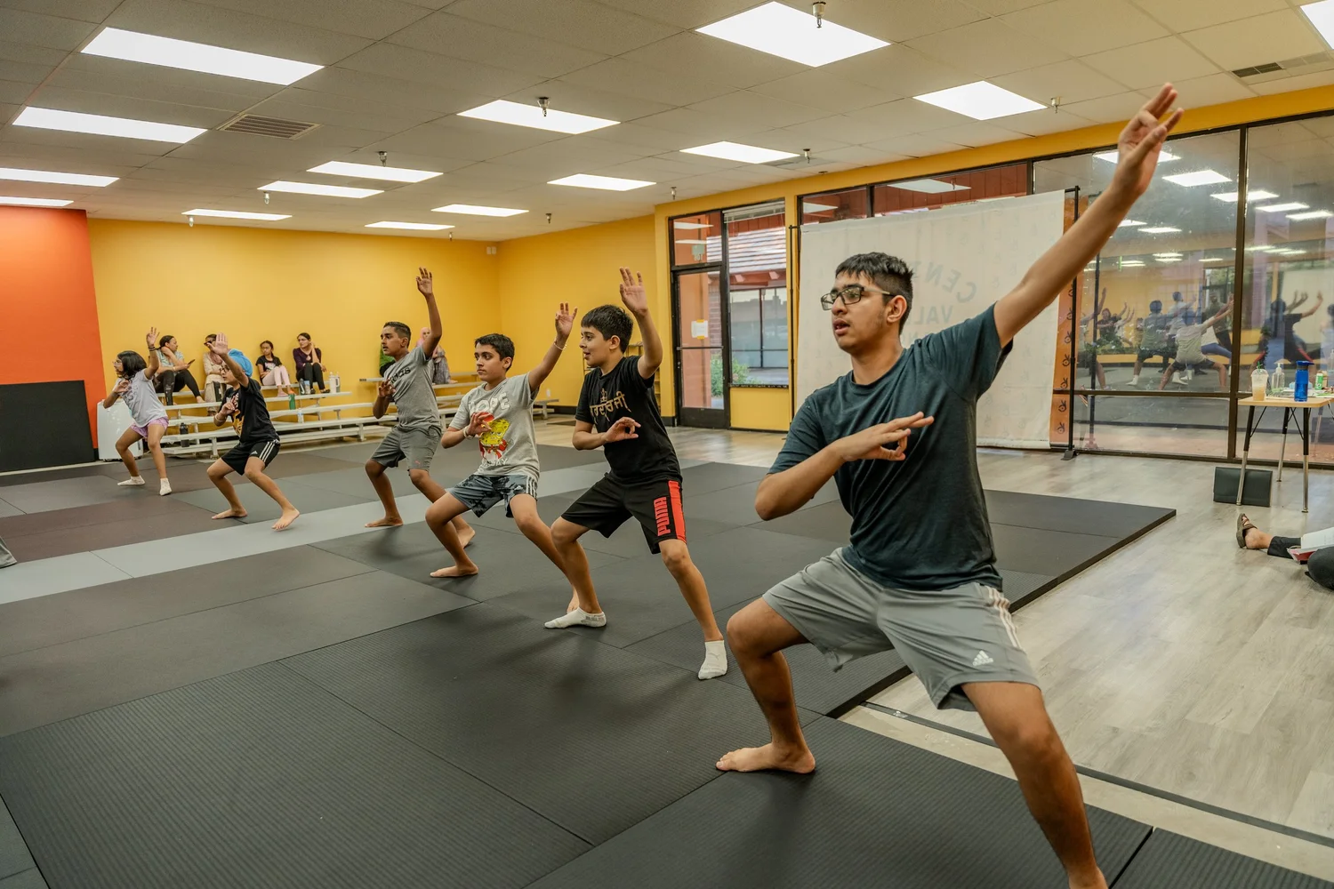 Central Valley Bhangra dancers practicing together in class