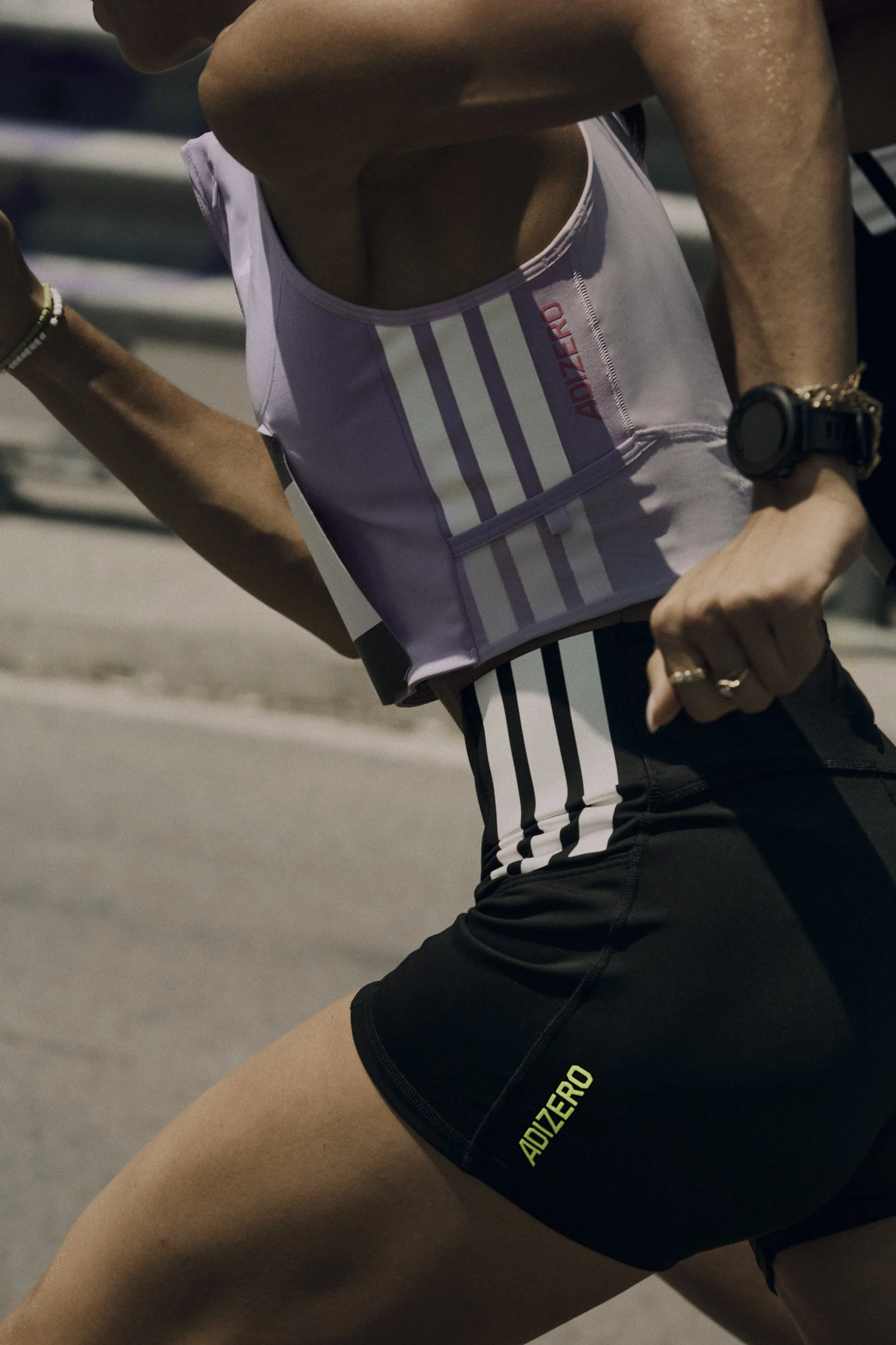 H24551_SS26_ADIZERO_PRO4_FEMALE_APPAREL_01.jpg