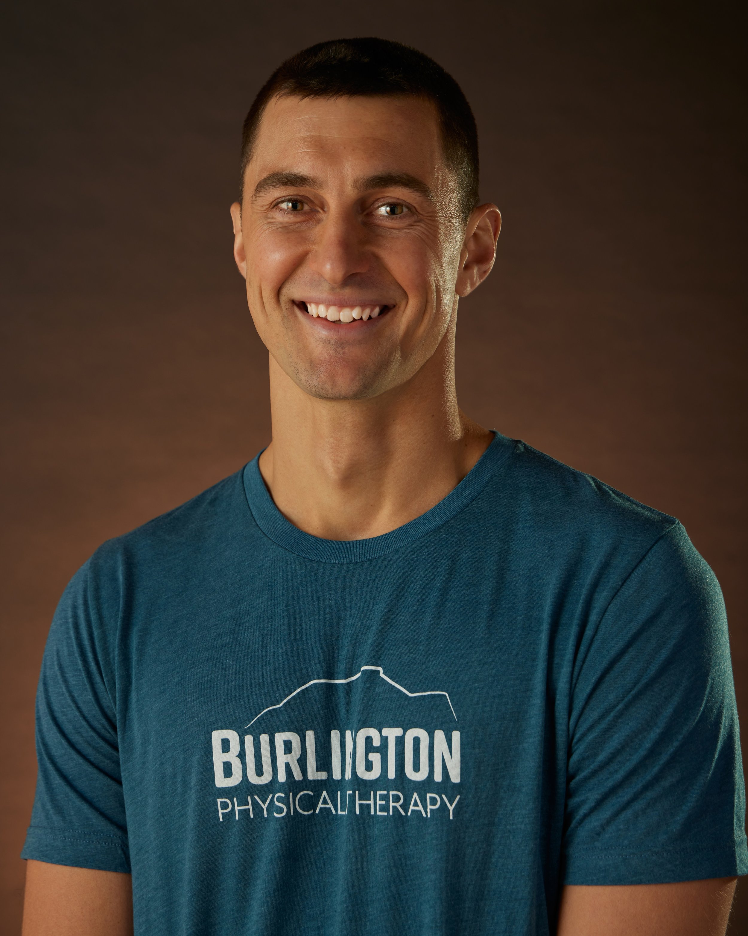 Headshot of Teddy Zabel, physical therapy at Burlington Physical Therapy.