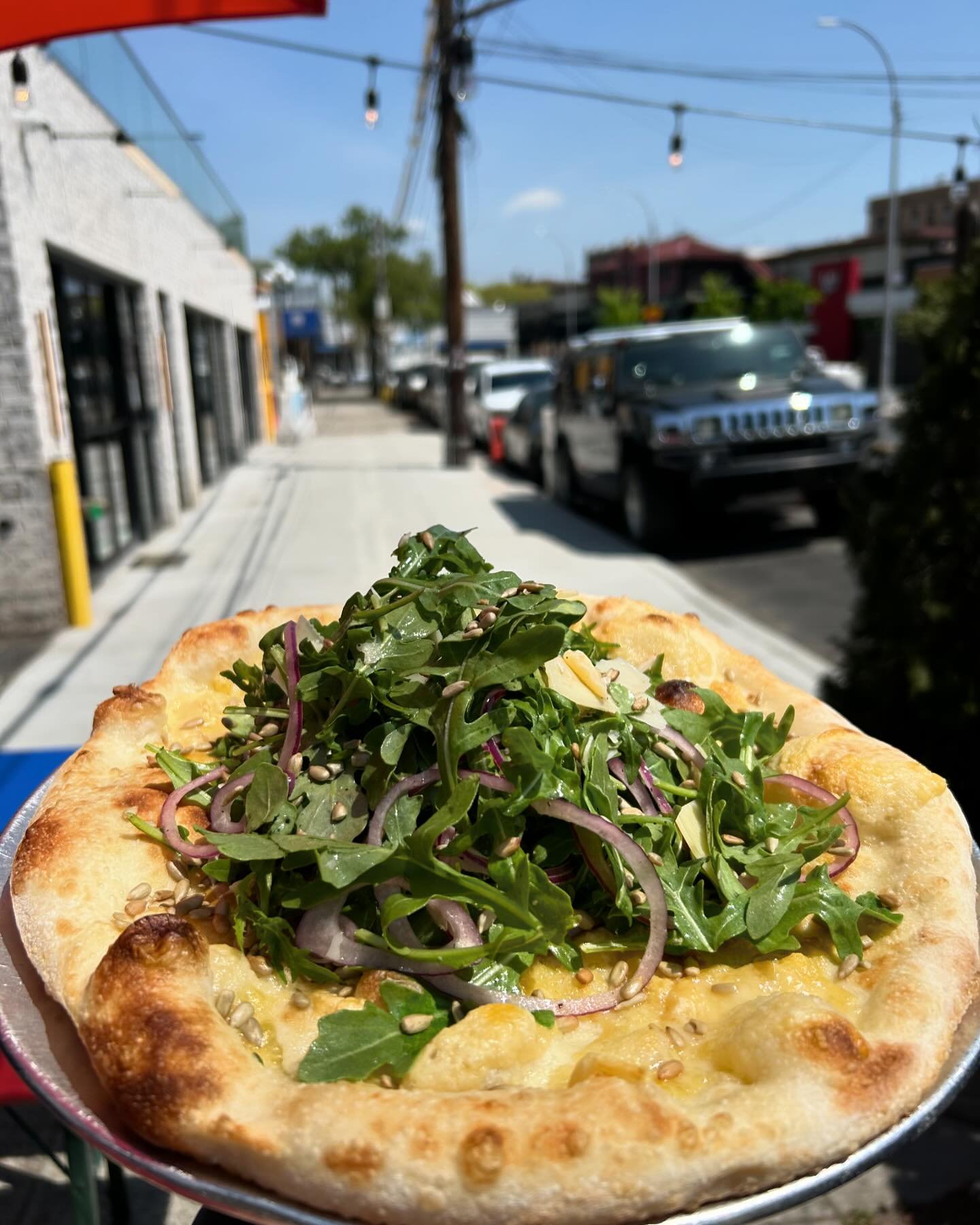 We did it! Perfect Day to top the Pizza with Arugula, Shaved Parmesan, Roasted Sunflower Seeds, Red Onion, Red Wine Vinegar and EVOO!

Get it here today or through our website for delivery. 
#livelyday #bronxpizza #nycpizza #kingsbridgesocialclub