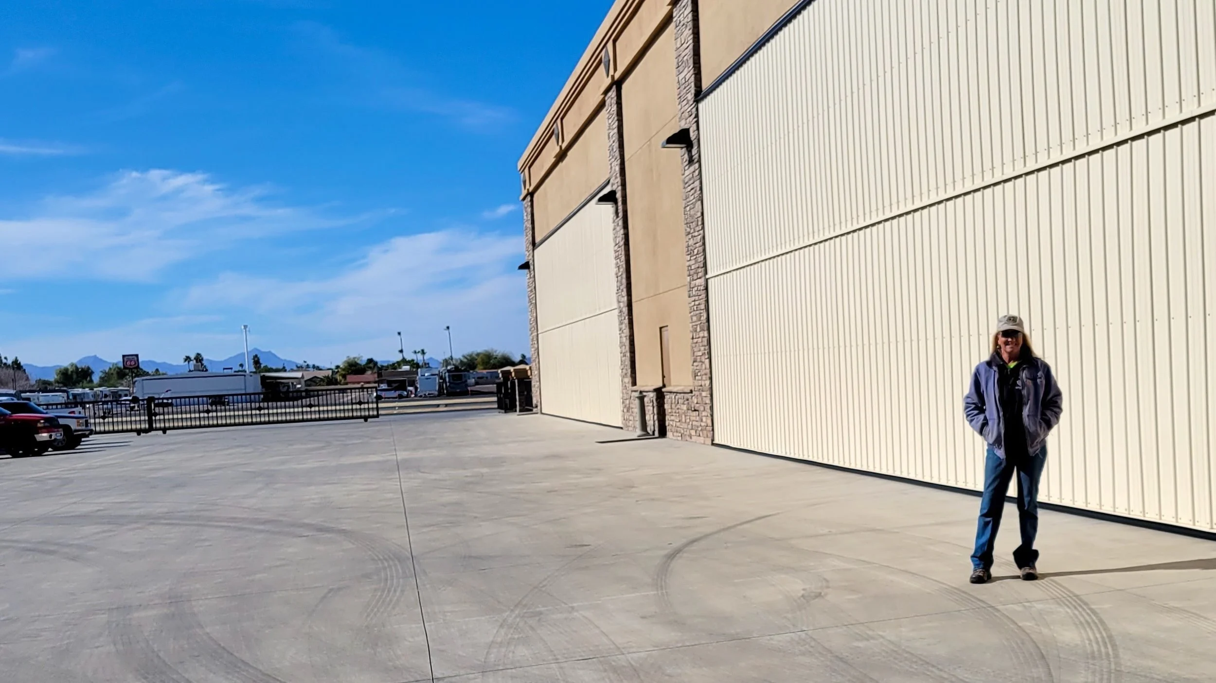 Oranssi technician working on a roof project