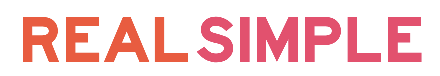 Text saying "REAL SIMPLE" with "REAL" in orange and "SIMPLE" in pink.