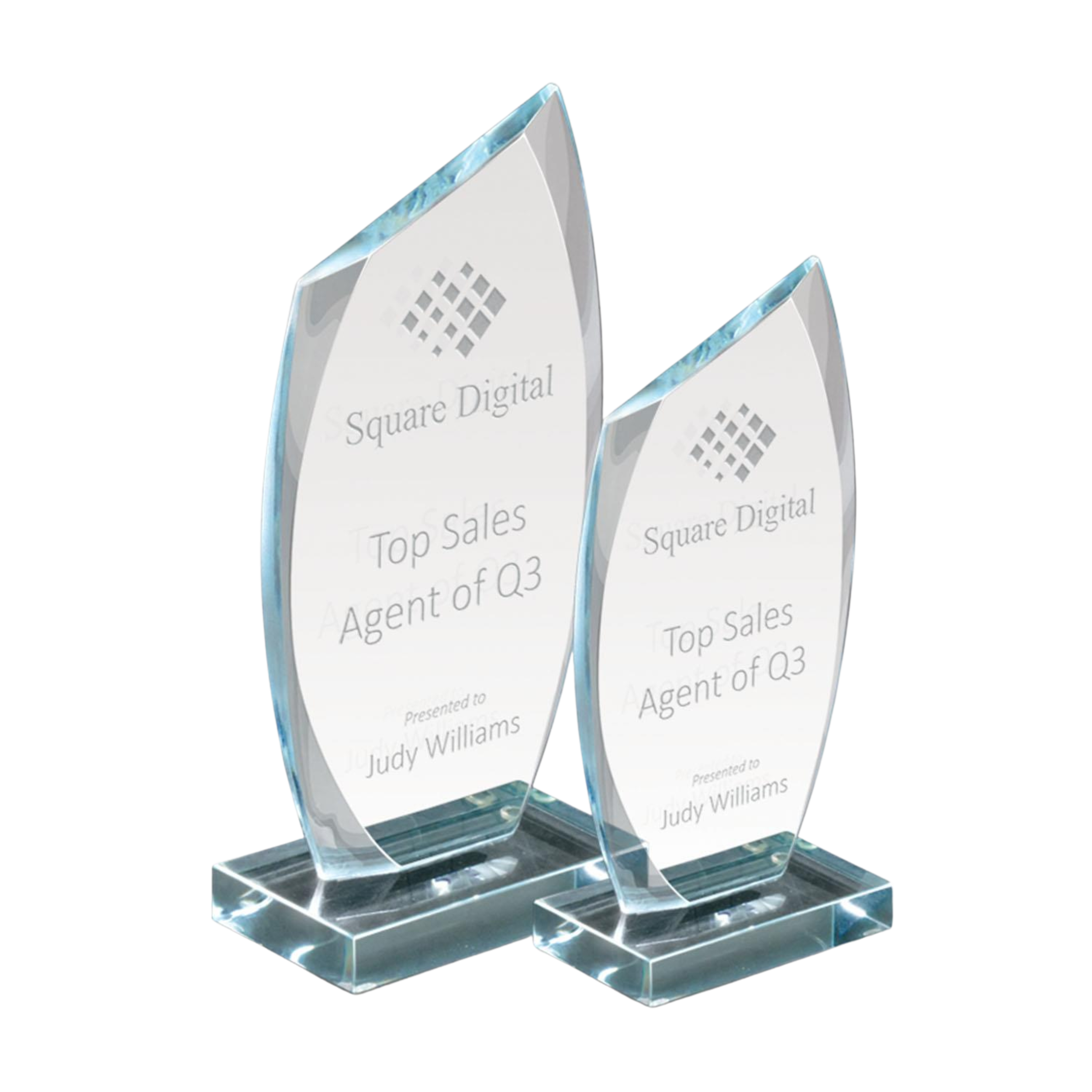 Two glass awards shaped like stones with the text 'Square Digital, Top Sales Agent of Q3, presented to Judy Williams' engraved on each, placed on clear glass bases.