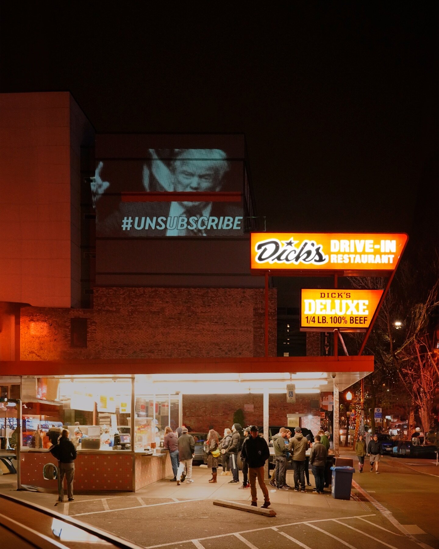 Unsubscribe projected above Dick&rsquo;s in Capitol Hill - an iconic Seattle spot with great night life foot traffic 🌃 #dicksdrivein #seattle #seattlenightlife #seattlenights #capitolhillseattle #unsubscribe