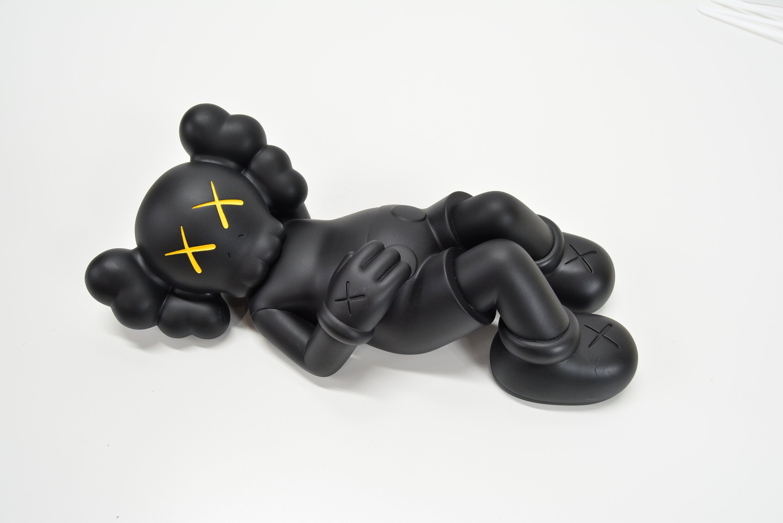 KAWS HOLIDAY JAPAN VINYL FIGURE (BLACK) — STANDARD X FUTURE